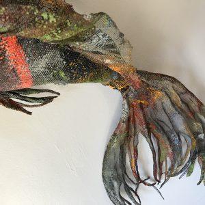 Sculpture of Koi fish created with painted and stitched aluminum screen